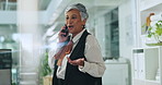Business, phone call and woman in office, conversation and planning with schedule for tax audit. Mature person, accounting and employee in workplace, financial consultant and feedback for investment
