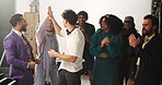 Applause, high five and smile with people on set together for shoot or videography satisfaction. Motivation, success or wrap with director and talent clapping behind the scenes for goals or target