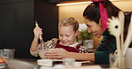 Baking, mother or girl with helping on Christmas for cake recipe, mix ingredients or santa cookies. Happy family, child or learning in home for muffin preparation, development and holiday celebration