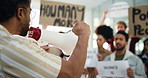 Protest, speaker and group of people for peace, justice and demonstration with posters to stop war. Freedom, shouting and men with women together with bullhorn for change, revolution and movement