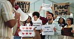 Protest, bullhorn and crowd of people for peace, justice and demonstration with posters to stop war. Freedom, shouting and men with women together with billboards for change, revolution and movement