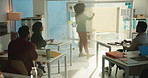 Whiteboard, classroom and teacher with students in university for learning, lesson and education. School, college and professor writing answers for lecture, discussion and development at academy