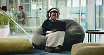 Laptop, headphones and online class with woman in college for video call, streaming and elearning. University webinar, research and listening with person on campus for digital, exam and tutorial