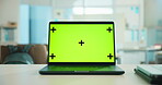 Laptop, green screen and mockup in office for advertising website on desk with tracking markers. Computer, workspace and display for marketing, business and monitor for software design on internet
