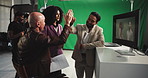 High five, director and people with screen for monitor, photoshoot or production planning in studio. Project, creative producer and man with digital tech for magazine catalogue, backstage or film