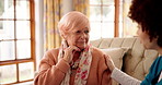 Old woman, healthcare and nurse with empathy in home for bad news, medical results and diagnosis. Consultation, caregiver and senior patient with comfort on sofa for cancer disease, support and help