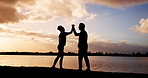 High five, hug and sunset with fitness couple outdoor together for training goals or target. Silhouette, success and support with athlete people in nature for bonding, exercise or workout motivation
