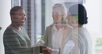 B2B, handshake and meeting with business women in office for introduction or partnership. Acquisition, greeting and merger with happy employee team shaking hands in workplace for agreement or deal