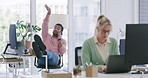 A lady in green sweater working in office in day time. A man talking on phone in office hour. A man and women working in office in day time, while a man is in relaxed mood talking in phone and lady is doing her work.  
