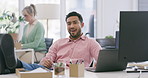 Lazy male office worker lounging at his desk messing around in the office. Bored businessman chewing gum with feet on his desk laughing. Unmotivated and tired workforce. Overworked and underpaid 