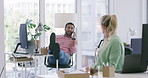 Playful and lazy employee being reprimanded by a colleague at the workplace. Male worker throwing papers in the office irritating his female manager. Unruly male at work annoying female team member