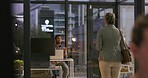 Rear view of a young businesswoman late for an interview with an annoyed looking employer in a modern office