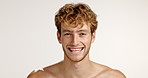 Space, laughing or face of man with skincare, facial treatment or confidence in studio. Topless, portrait or funny person on white background with smile, model or mockup for glow, beauty or wellness