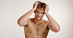 Face, man and grooming for haircare, studio or treatment for texture, white background or confident. Mockup space, proud and person with healthy hair, routine and cosmetics for hairstyle in Canada