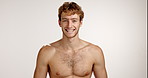 Natural, face and happy man in studio with skincare, facial treatment or anti aging routine. Portrait, topless or male person on white background with smile or cosmetics for glow, beauty or wellness