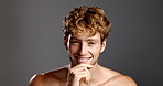 Studio, man and face with wellness for skincare, dermatology and confidence with smile for beard. Mockup space, male person and model in portrait for cosmetics, smooth and hygiene in gray background
