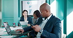 Man, typing and phone at meeting with laptop, charts and finance with review at investment agency. Person, broker and click with fintech, boardroom and pc for graphs, results or revenue for company