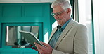 Tablet, research and mature businessman in office with investment or finance proposal. Digital technology, happy and male financial manager with communication, email or contact for negotiation.