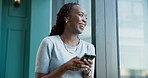 Phone, typing and black woman laughing in office for meme, joke and comedy writer review script. Mobile, funny idea and creative worker in business startup for text, story or reading email at window