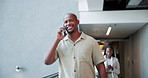 Business, phone call and walking with man in convention center for conference, seminar or tradeshow. Communication, development and smile of happy employee in lobby for event, expo or symposium