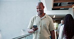 Office, man and texting with smartphone, walking or chat with source for story, journalist or smile. Happy, reporter and person with mobile app for message, newsroom and communication with contact