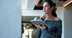 Thinking, woman and tablet in lobby at hotel for research, venue planning and check schedule. Thoughts, female coordinator and digital with booking details, ideas and information for event management