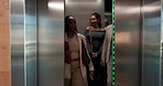Business, people and exit elevator in office for work arrival, enter building and company floor. Professional, employees and walking from lift in morning for leaving meeting, appointment and greeting