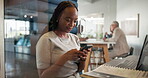 Laughing, employee and woman with smartphone, texting and funny post on social media, break or tech. Happy, account manager and black person with mobile app for chat, smile and privacy of cubicle