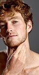 Beard, beauty and face of man in studio for hygiene, masculine grooming or skincare wellness. Aesthetic, cleaning and self care with confident model on gray background for facial dermatology
