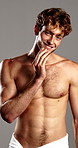 Beard, face and smile of shirtless man in studio for masculine grooming, hygiene or skincare. Body, health and wellness with happy muscular model on gray background for fitness or transformation