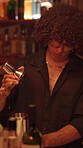 Bartender, drink mixing and man in club, event and skills for cocktails, happy hour and hospitality. Person, expert and employee in workspace, alcohol beverage and mixologist with party and service