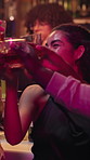 Toast, drinks and girl friends in nightclub for fun, reunion or social event together at bar. Happy hour, excited and female people with alcohol beverage for cheers, celebration or party at pub.