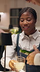 Happy woman, customer or waiter with champagne for fine dining service or hospitality in restaurant. Female person, guest and smile with alcohol or serving drinks for catering or hosting in dinner