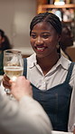 Happy, woman and cheers with wine at restaurant for date, celebration and anniversary event. Smile, couple and toast wine with partner for congratulations, romantic dinner and bonding for fine dining