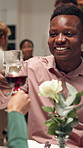 Smile, man and cheers with wine at restaurant on date, celebration and anniversary event. Happy, couple and toast alcohol with partner for congratulations, romantic dinner and bonding for fine dining