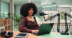 Studio, laptop and African woman with mic for podcast, editing stream and recording with tech. Content creation, journalism and happy person on computer for audio, radio presenter and hosting show