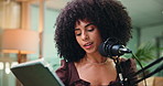 Tablet, talking and black woman with mic in studio for podcast, radio or interview with online questions. Content creation, broadcast and person with digital tech for hosting, presenter and recording