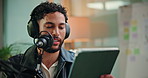 Tablet, presenter and man with mic in studio for podcast, broadcast or interview with online questions. Content creation, talking and person with digital tech for hosting, radio show and recording