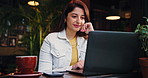 Laptop, reading and remote work with woman in coffee shop for research or small business startup. Computer, information and planning with freelance Indian employee in cafe or restaurant for service