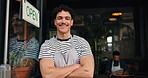 Waiter, face and arms crossed at door of restaurant for welcome, customer service and hospitality. Small business, manager and happy at entrance for retail, commerce industry and ready for assistance