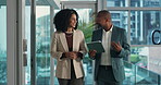 Business, woman and meeting with tablet in lobby for discussion, schedule update and finance report. Staff, team and talk with digital for accounting proposal, financial feedback and investment offer