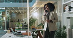 Woman, talking and consultation in office, phone call and smile for project update and working late. Happy, discussion and person with mobile for investment strategy, financial advisor and night