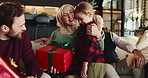 Child, hug or grandma with Christmas gift for surprise, support or festive celebration in home. Shock, wow or girl giving present for gratitude, mature parent or love for holiday tradition or care