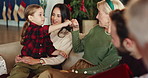 Fist bump, family and happy for Christmas with social gathering, reunion and celebration on holiday. Generations, home and people for festive season with bonding, love and support for care and fun