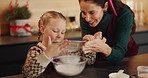 Flour, sifting and mother with kid for baking in kitchen for cooking, teaching or bonding in home. Ingredients, learning and mom with girl for preparing dessert, cookies or cake for snack in house.