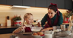 Happy, baking and mom with child in kitchen for learning, bonding or cooking together in home. Laugh, teaching and mother with kid for preparing cookies, cake or dessert with ingredients in house.