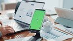 Phone, green screen and meeting in office for accounting, finance report and performance. Mockup space, mobile and man typing on laptop for financial planning, tax information and investment proposal