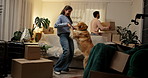 Dancing, box and couple with dog in new home, rental apartment and property for homeownership. Real estate, music and happy man, woman and pet celebrate for relocation, mortgage and house investment