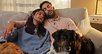 Sleep, pet and couple on sofa in new home with boxes, hug and mortgage with dogs. Relax, animals and tired people resting in house with romantic embrace, love and fatigue with property investment