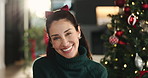 Christmas, face and funny with woman in living room of home for December holiday season. Festive, laughing and smile of happy mature person in apartment for winter celebration or tradition at night
